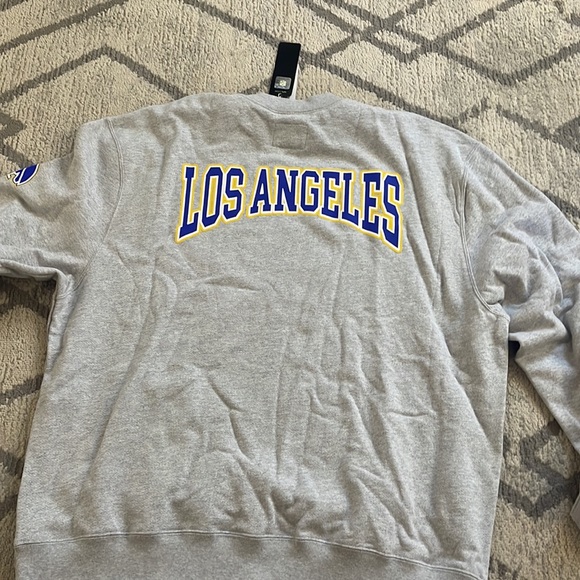 OVO® / NFL LOS ANGELES RAMS CREWNECK - HEATHER GREY
XXX-Large - Picture 2 of 3